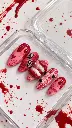 Ongles gothiques aux éclaboussures rouges (1).webp